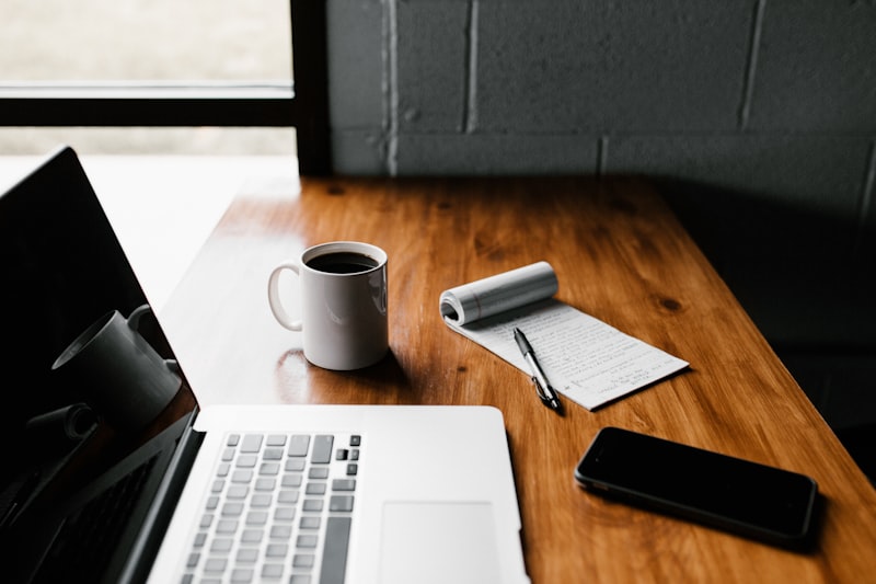 Person working with structured notes and planning documents